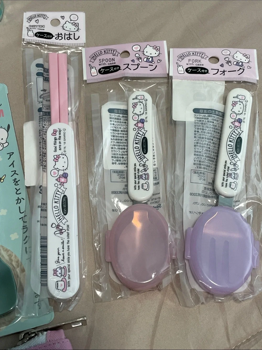 Sanrio Bundle: includes cups, utensils, notebook and zippered pouch.